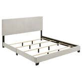 Best Furniture Outlet - Coaster - Dorian Fabric Upholstered Eastern King Panel Bed Cream - 300852KE