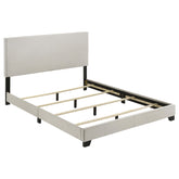 Best Furniture Outlet - Coaster - Dorian Fabric Upholstered Queen Panel Bed Cream - 300852Q