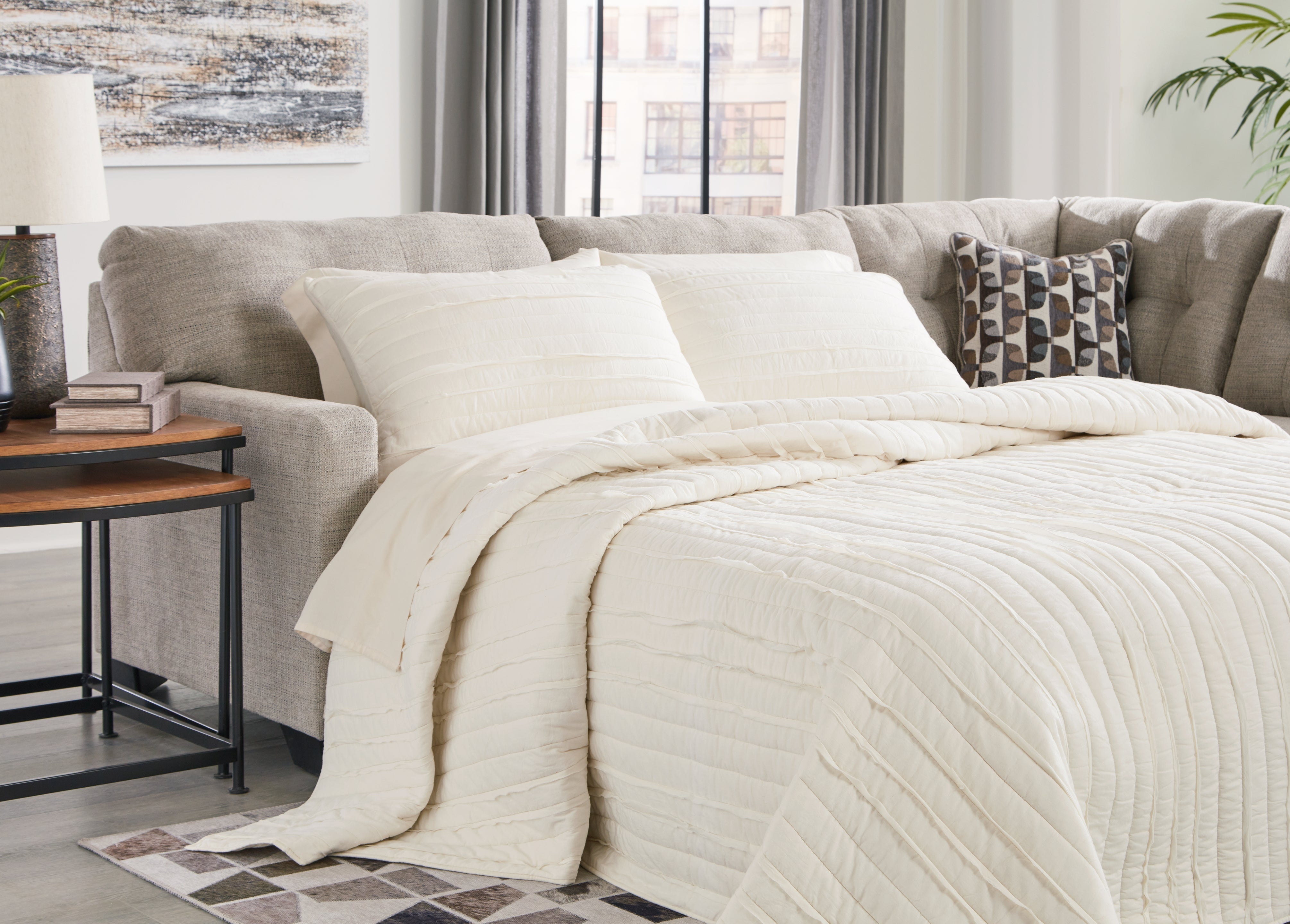 Best Furniture Outlet - Ashley Furniture - Mahoney Sectional - 2-Piece Sleeper Sectional with Chaise / Pebble - 31004S4