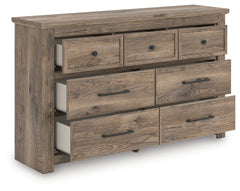 Best Furniture Outlet - Ashley Furniture - Rusticott Bedroom - Seven Drawer Dresser / Brown - PCB2260-31