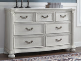 Best Furniture Outlet - Ashley Furniture - Montelaine Bedroom - California King Upholstered Panel Bed / Antique White - B795B7