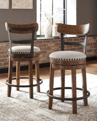 Best Furniture Outlet - Ashley Furniture - Valebeck Dining Room - UPH Swivel Barstool (1/CN) / Brown - D546-424