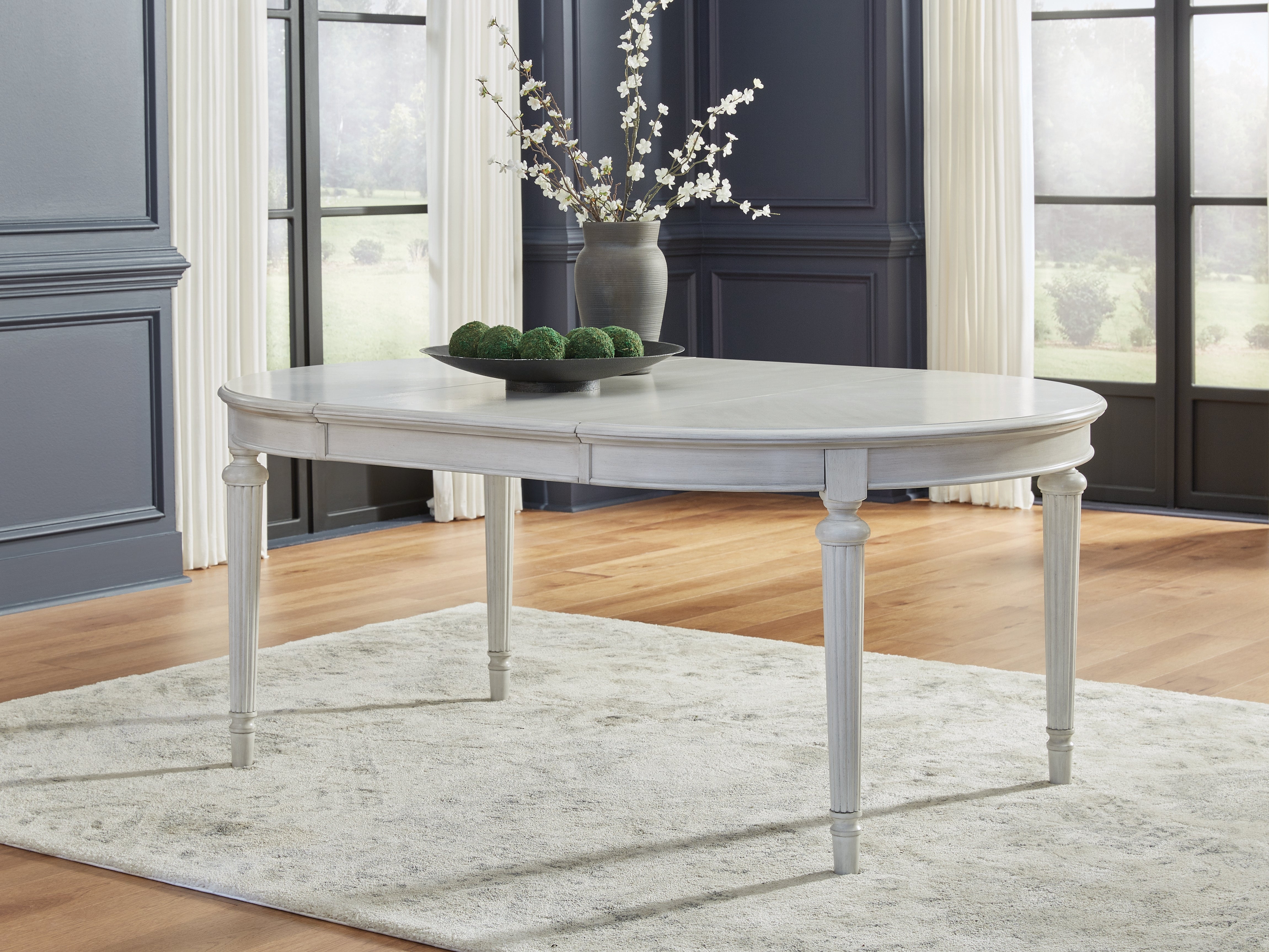 Best Furniture Outlet - Ashley Furniture - Montelaine Dining Room - Oval Dining Room EXT Table / Antique White - D795-35