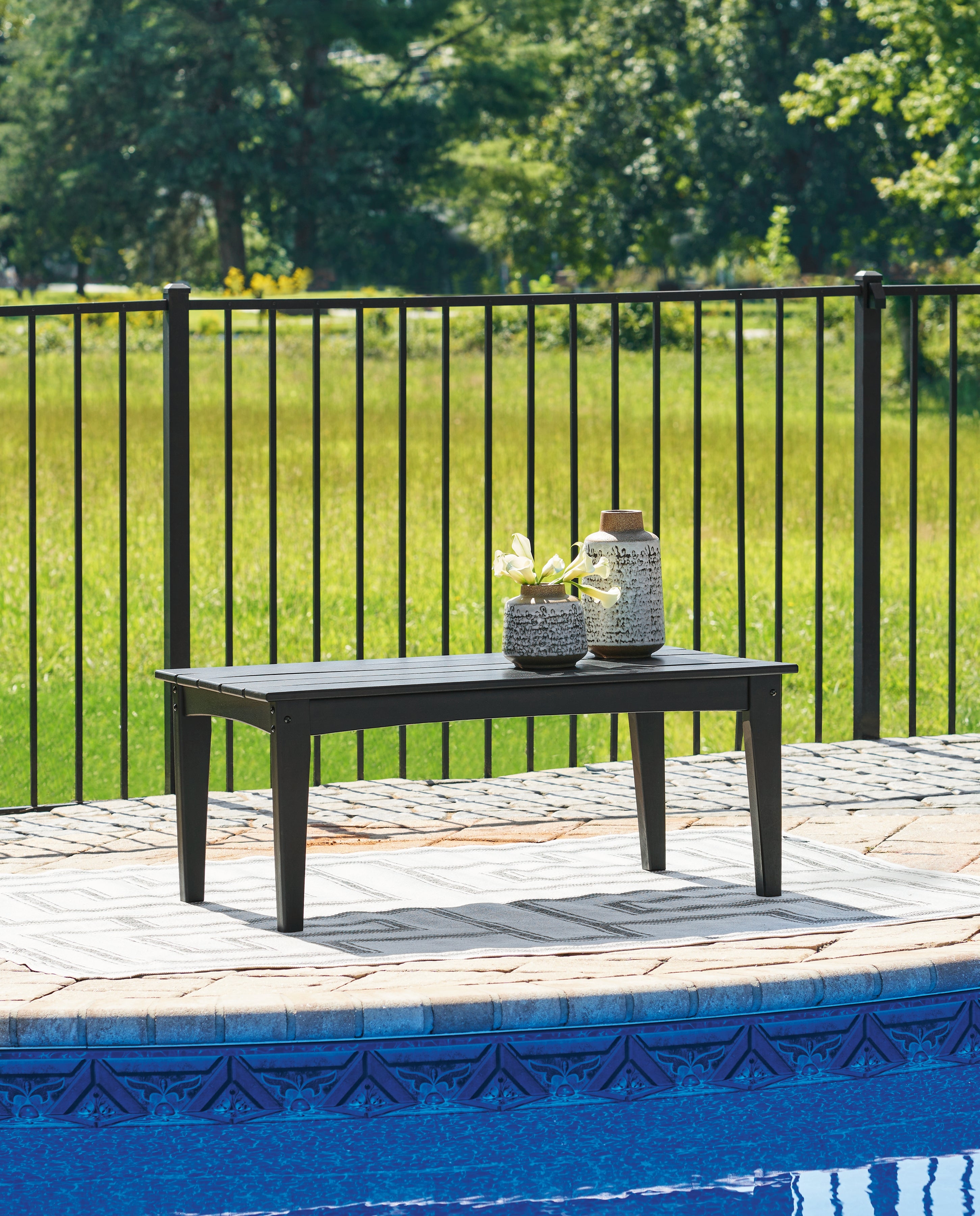 Best Furniture Outlet - Ashley Furniture - Hyland wave Outdoor - Rectangular Cocktail Table / Black - P108-701