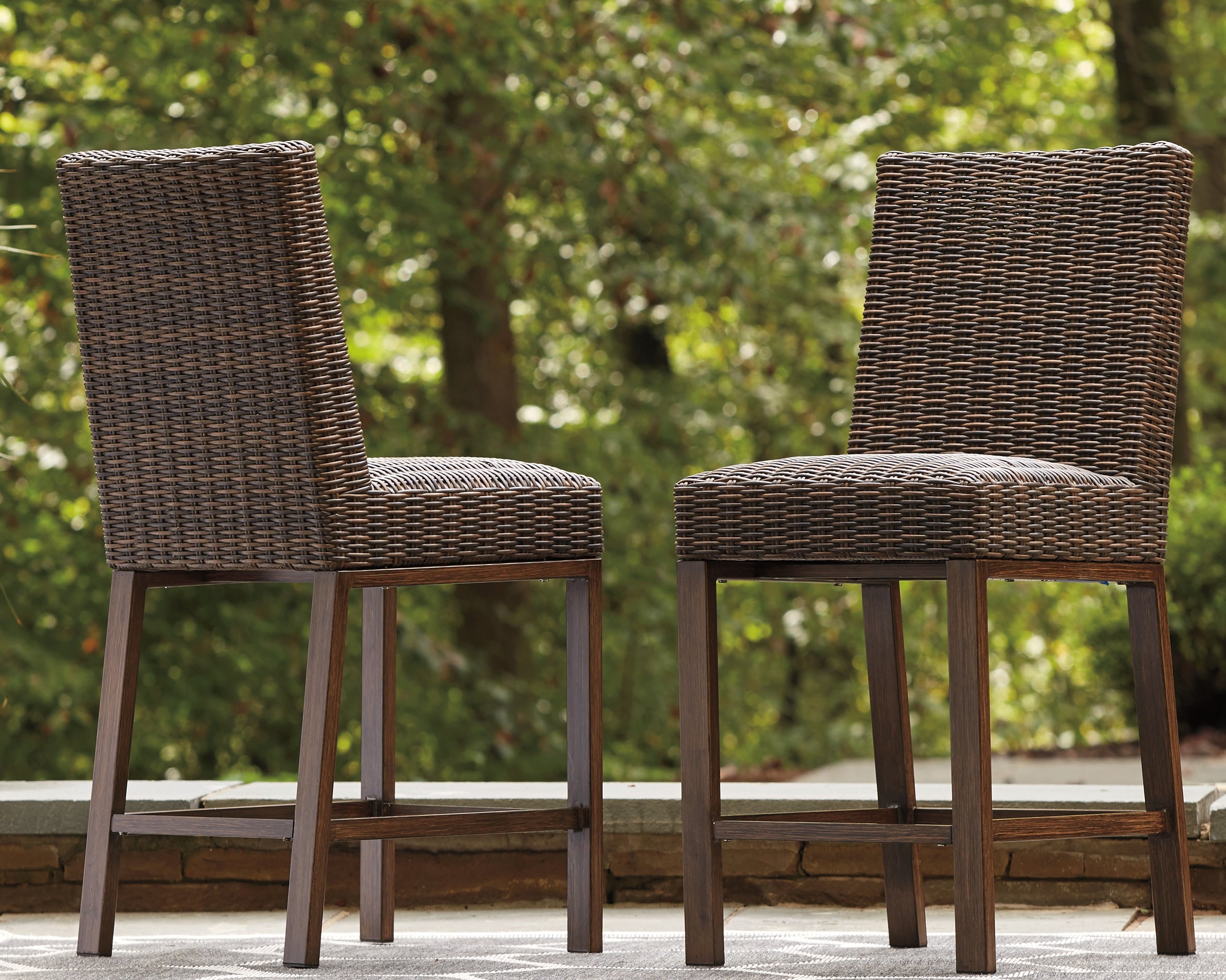 Best Furniture Outlet - Ashley Furniture - Paradise Trail Outdoor - Barstool (Set of 2) / Medium Brown - P750-130