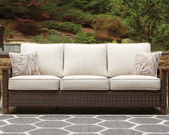 Best Furniture Outlet - Ashley Furniture - Paradise Trail Outdoor - Sofa with Cushion / Medium Brown - P750-838