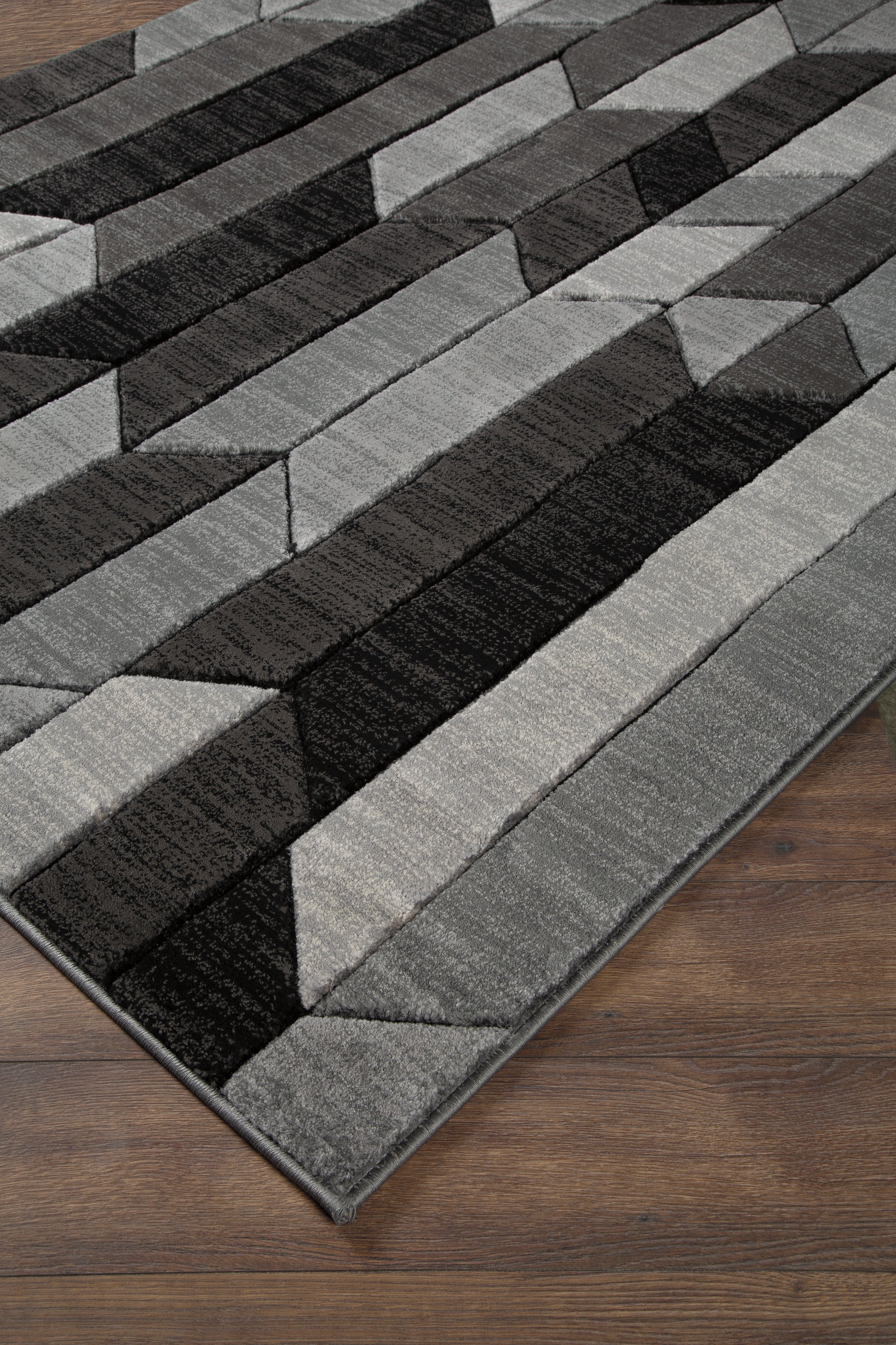 Best Furniture Outlet - Ashley Furniture - Chayse Rug - 6'6" x 9'6" Rug / Black/Gray - R403461