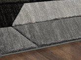 Best Furniture Outlet - Ashley Furniture - Chayse Rug - 5' x 6'7" Rug / Black/Gray - R403462