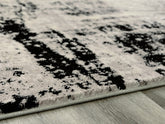 Best Furniture Outlet - Ashley Furniture - Zekeman Rug - 7'10" x 10' Rug / Black/Cream/Gray - R404921