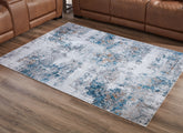 Best Furniture Outlet - Ashley Furniture - Garyard Rug - 5' x 7' Washable Rug / Multi - R405772