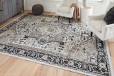 Best Furniture Outlet - Ashley Furniture - Gregmoore Rug - 5'2" x 6'10" Washable Rug / Multi - R405822
