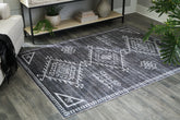 Best Furniture Outlet - Ashley Furniture - Arloman Rug - 5' x 7' Washable Rug / Black/Cream/Gray - R405932