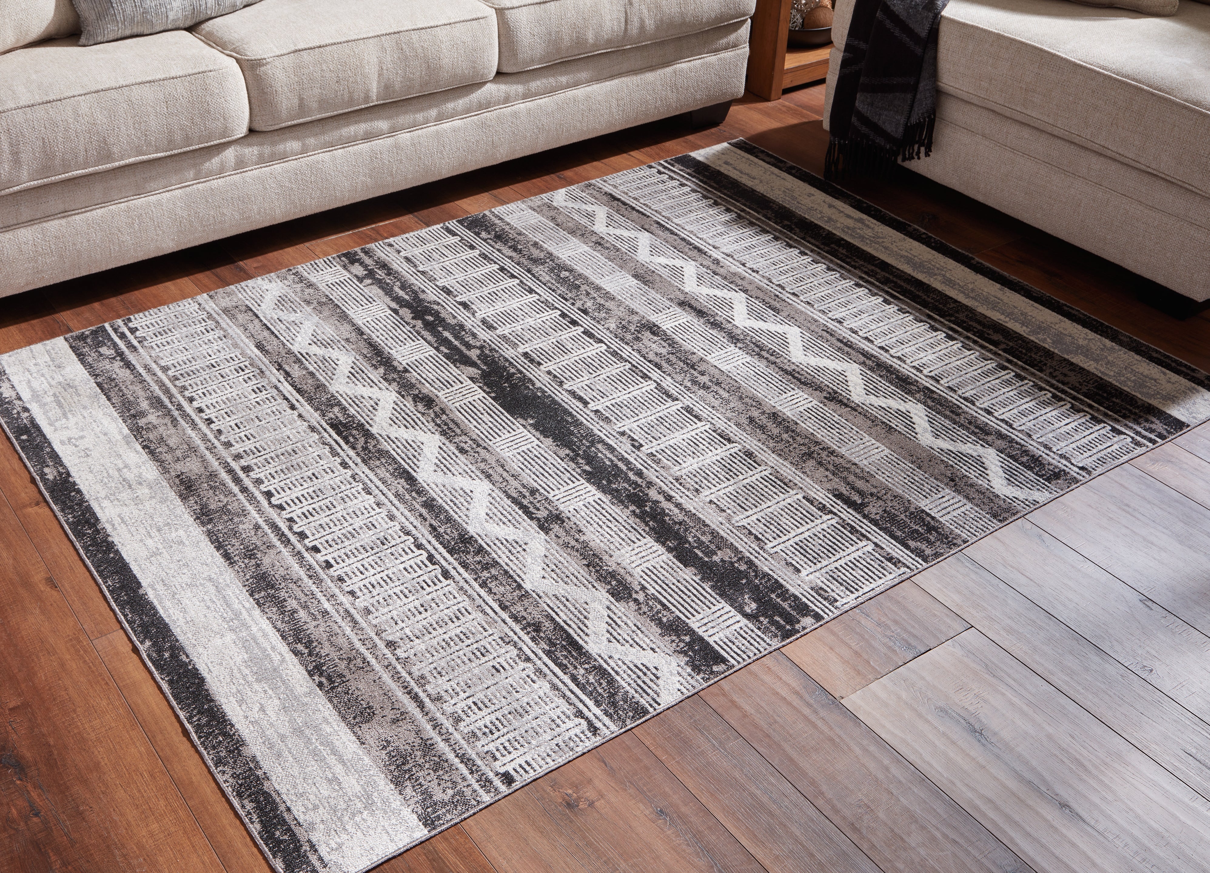 Best Furniture Outlet - Ashley Furniture - Henchester Rug - 5' x 7' Washable Rug / Multi - R405992