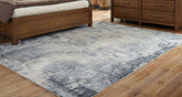 Best Furniture Outlet - Ashley Furniture - Langrich Rug - 7'10" x 10'6" Rug / Blue/Gray/Cream - R406131