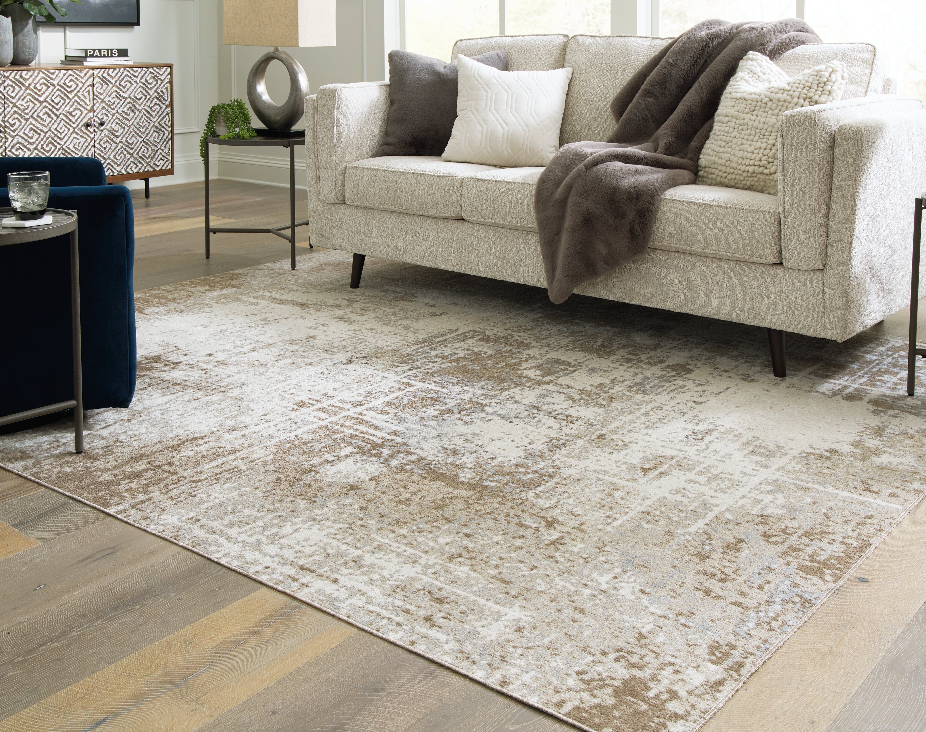 Best Furniture Outlet - Ashley Furniture - Grifflain Rug - 7'10" x 10'3" Washable Rug / Tan/Brown/Gray - R406231
