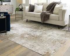Best Furniture Outlet - Ashley Furniture - Grifflain Rug - 7'10" x 10'3" Washable Rug / Tan/Brown/Gray - R406231