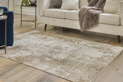 Best Furniture Outlet - Ashley Furniture - Grifflain Rug - 5'1" x 7' Washable Rug / Tan/Brown/Gray - R406232