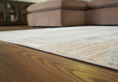 Best Furniture Outlet - Ashley Furniture - Truward Rug - 8' x 10' Rug / Linen/Gray/Caramel - R406471