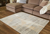 Best Furniture Outlet - Ashley Furniture - Truward Rug - 5' x 7' Rug / Linen/Gray/Caramel - R406472