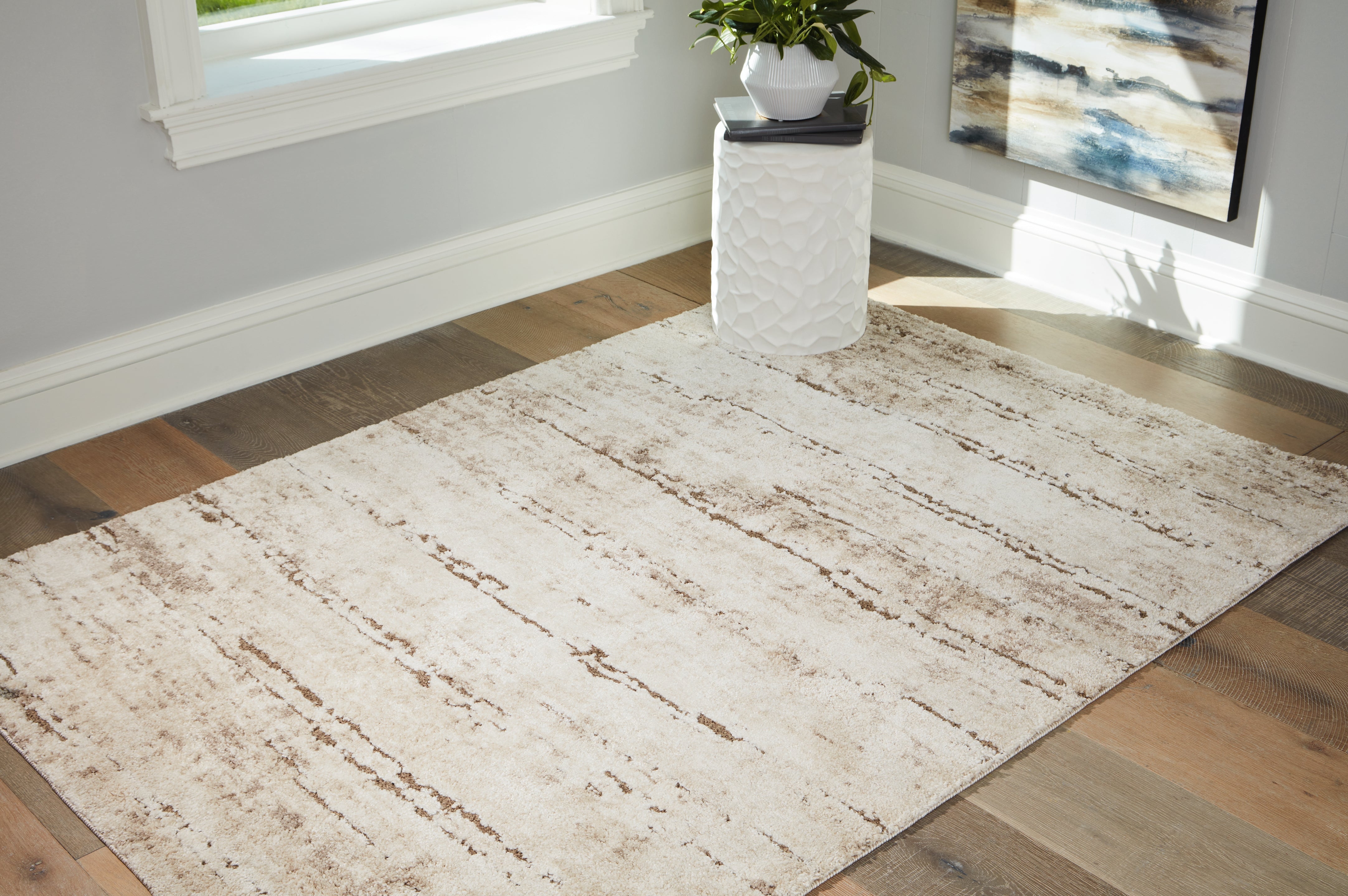 Best Furniture Outlet - Ashley Furniture - Kasney Rug - 5' x 7' Rug / Cream/Brown - R406852