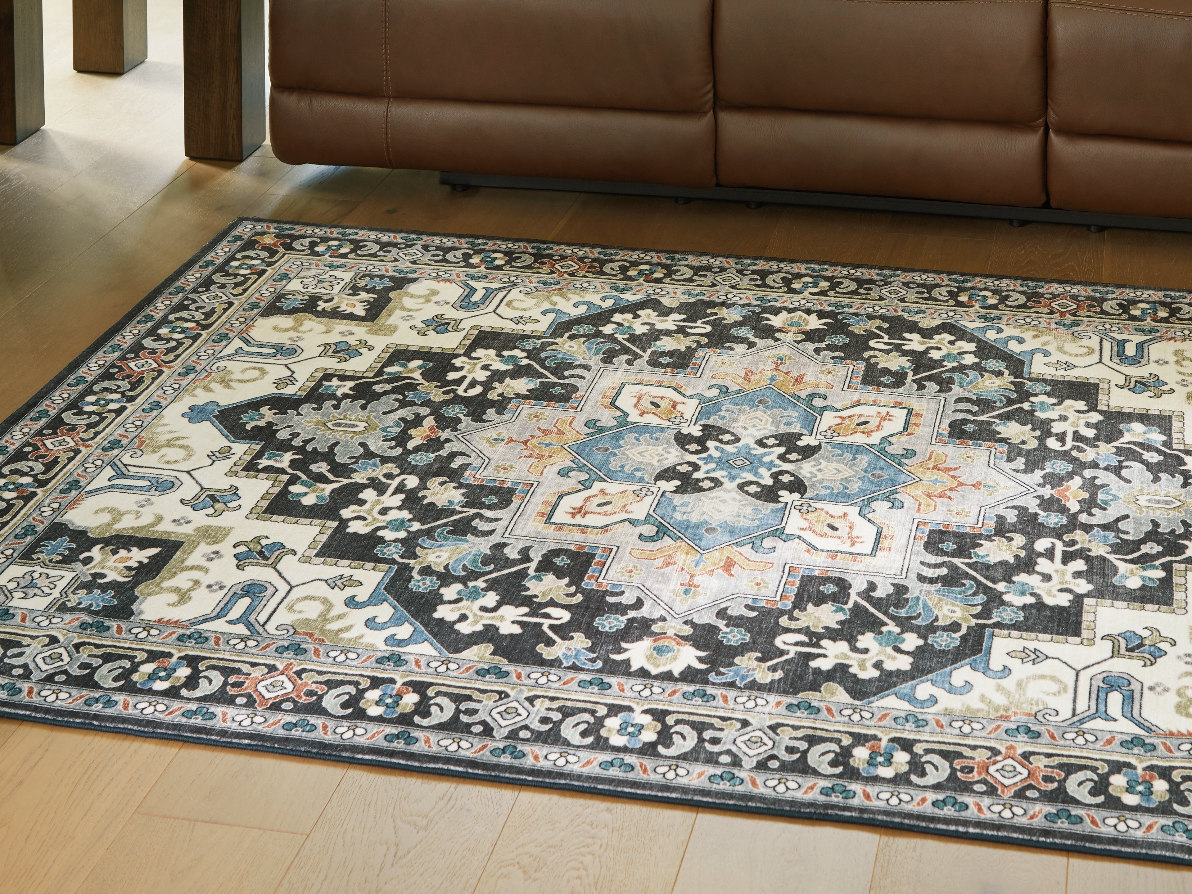 Best Furniture Outlet - Ashley Furniture - Leningston Rug - 5' x 7' Washable Rug / Black/Cream/Blue - R407062