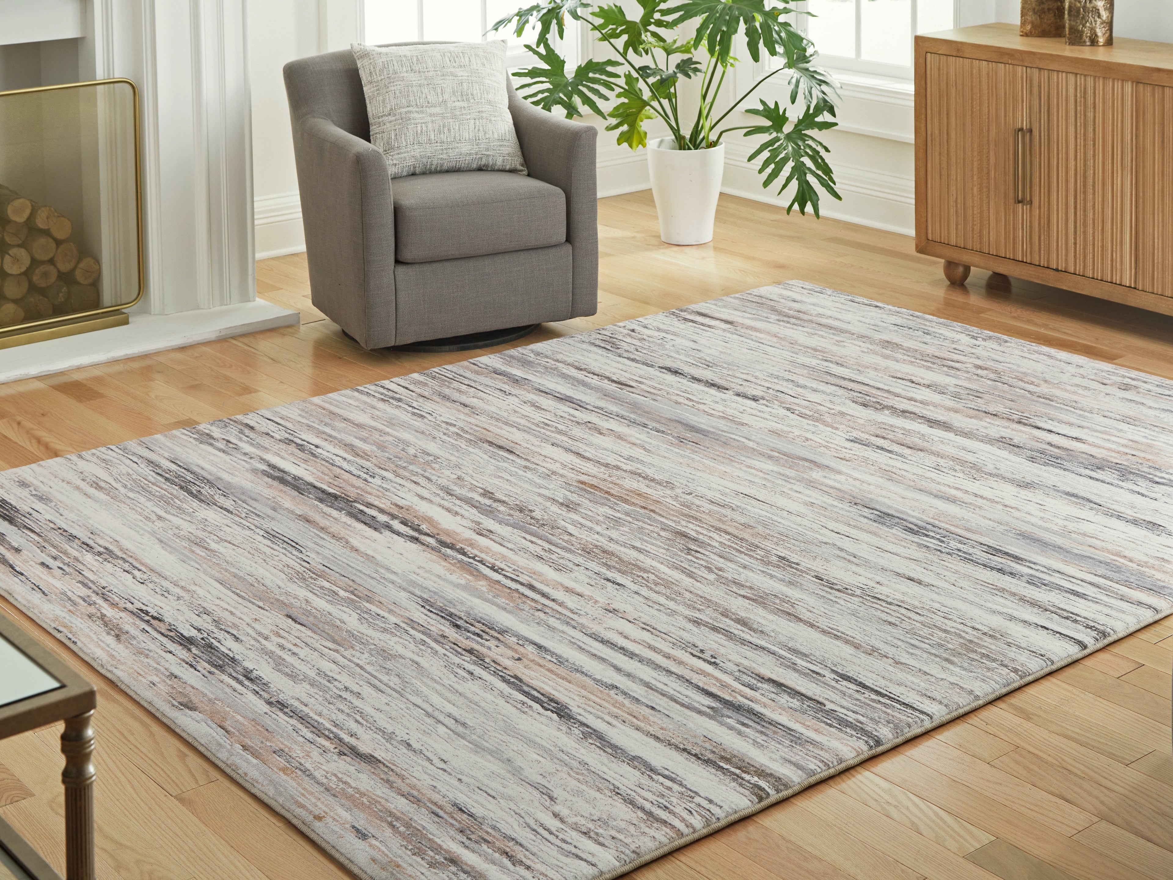 Best Furniture Outlet - Ashley Furniture - Nace Rug - 7'6" x 9'6" Area Rug / Gray/Brown/White - R407471
