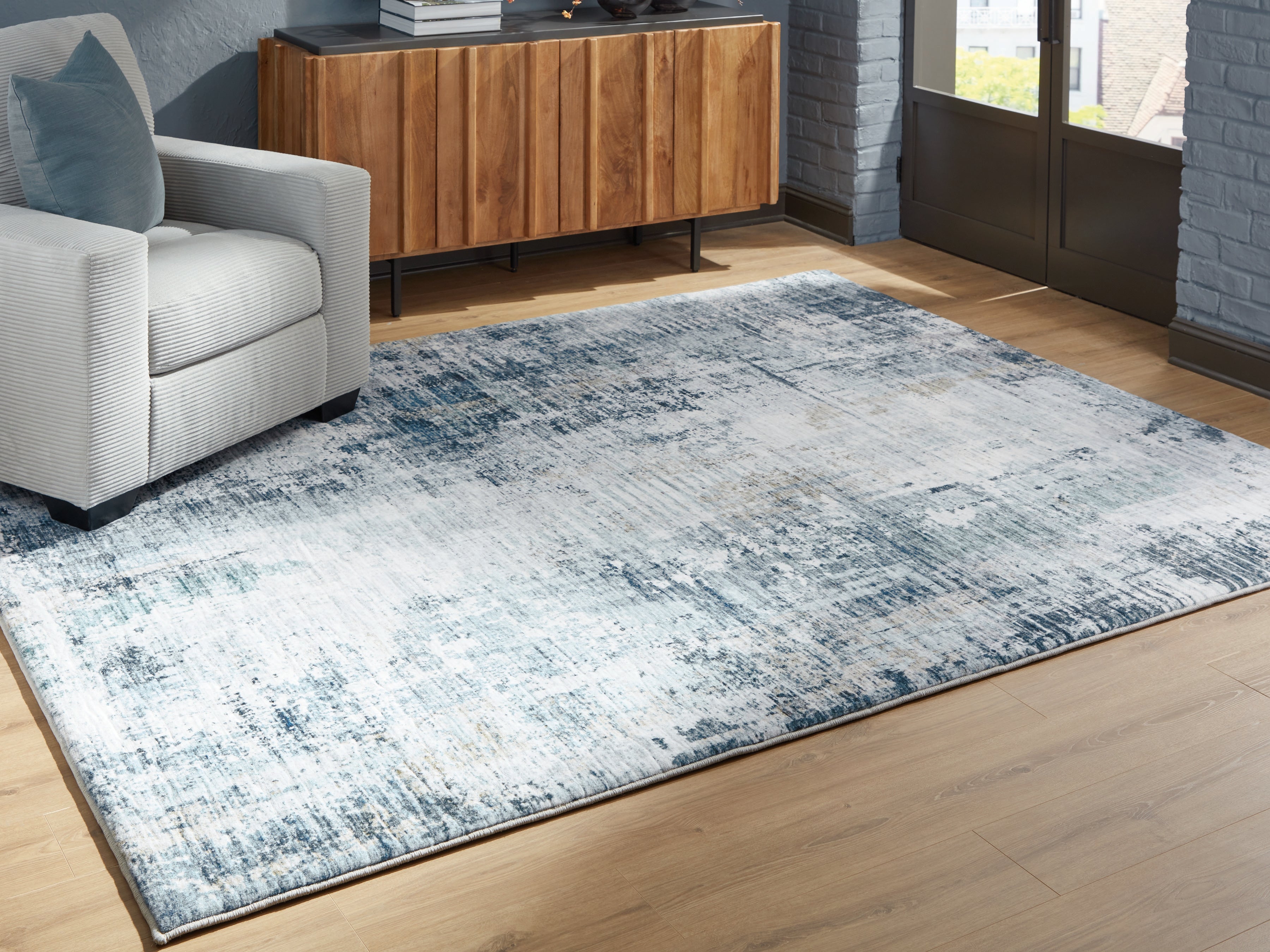 Best Furniture Outlet - Ashley Furniture - Arlenmont Rug - 7'6" x 9'6" Area Rug / Blue/White/Brown - R407481