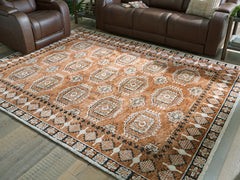 Best Furniture Outlet - Ashley Furniture - Qaabiz Rug - 7'8" x 10' Area Rug / Sienna/Ivory/Black - R407521