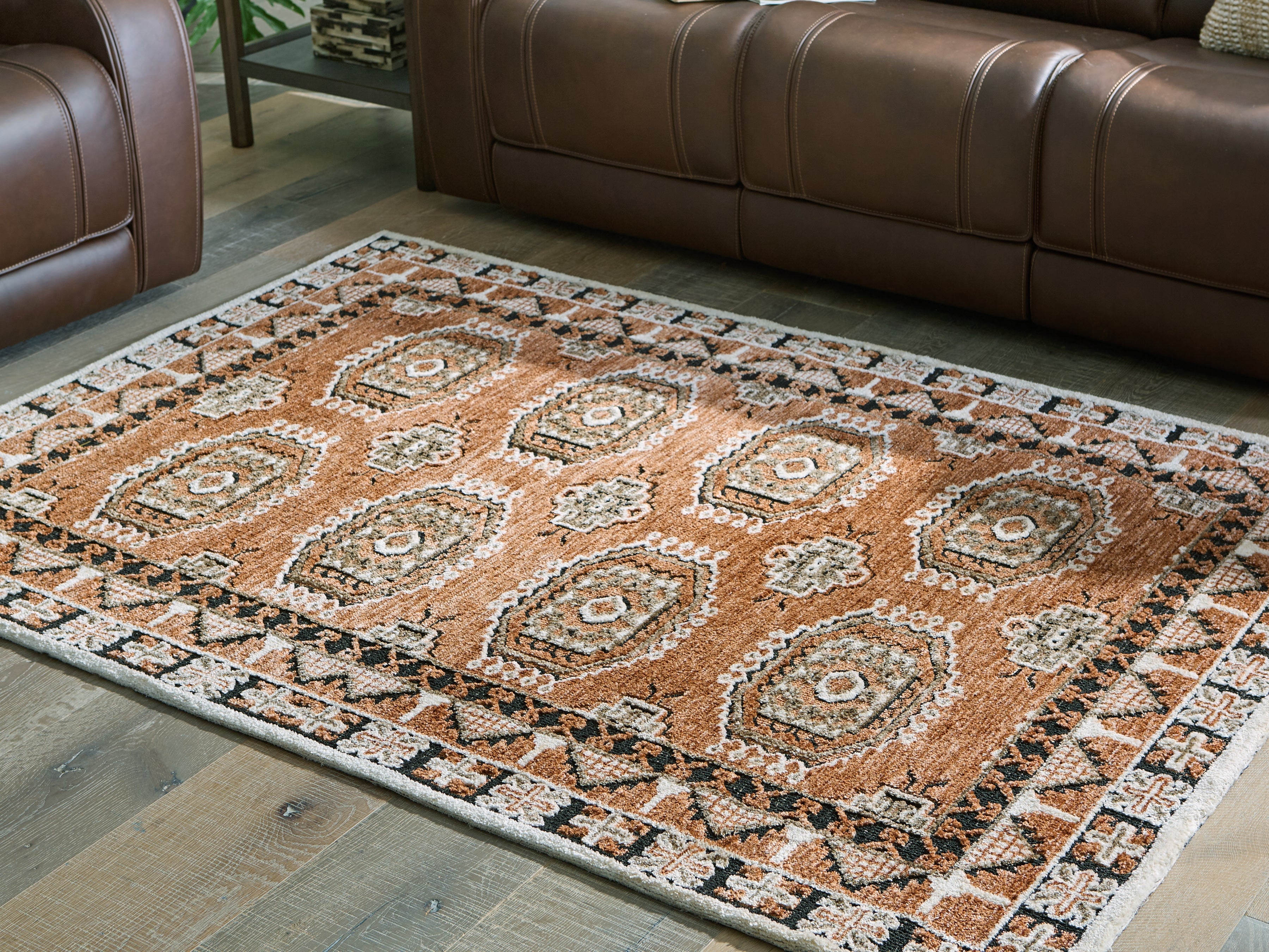 Best Furniture Outlet - Ashley Furniture - Qaabiz Rug - 5' x 7' Area Rug / Sienna/Ivory/Black - R407522