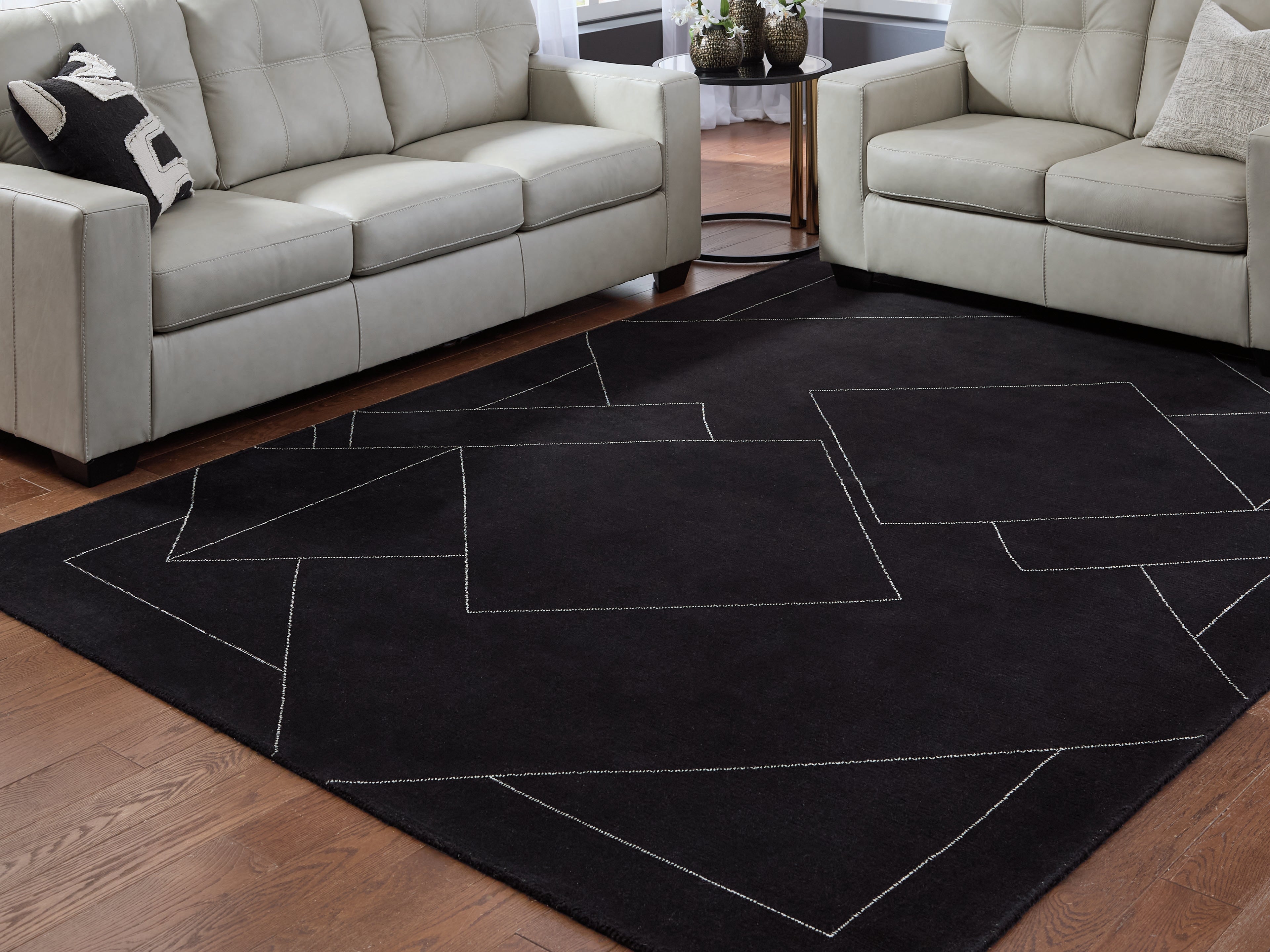 Best Furniture Outlet - Ashley Furniture - Marav Rug - 7'8" x 10' Area Rug / Black/White - R407531