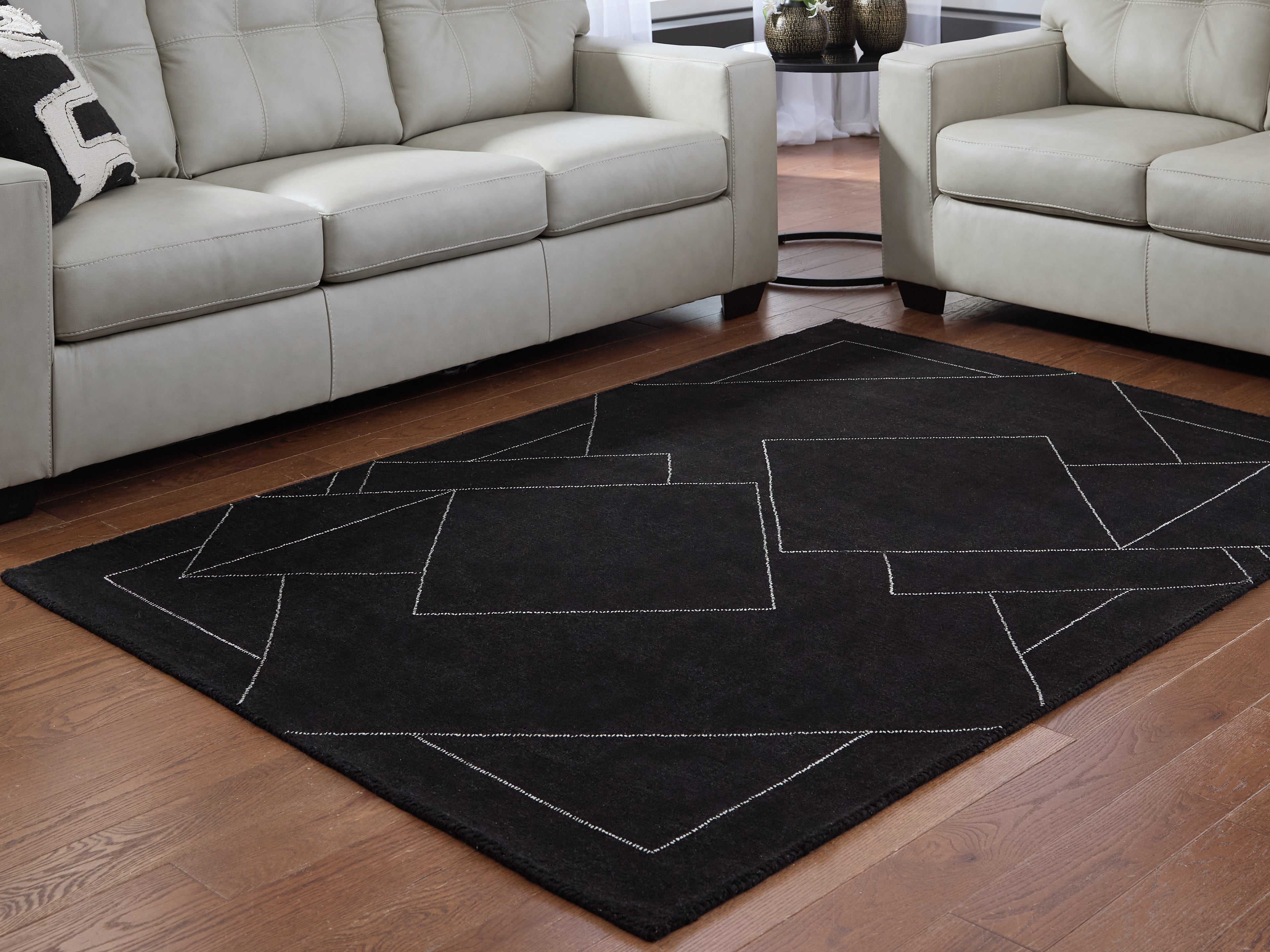 Best Furniture Outlet - Ashley Furniture - Marav Rug - 7'8" x 10' Area Rug / Black/White - R407531