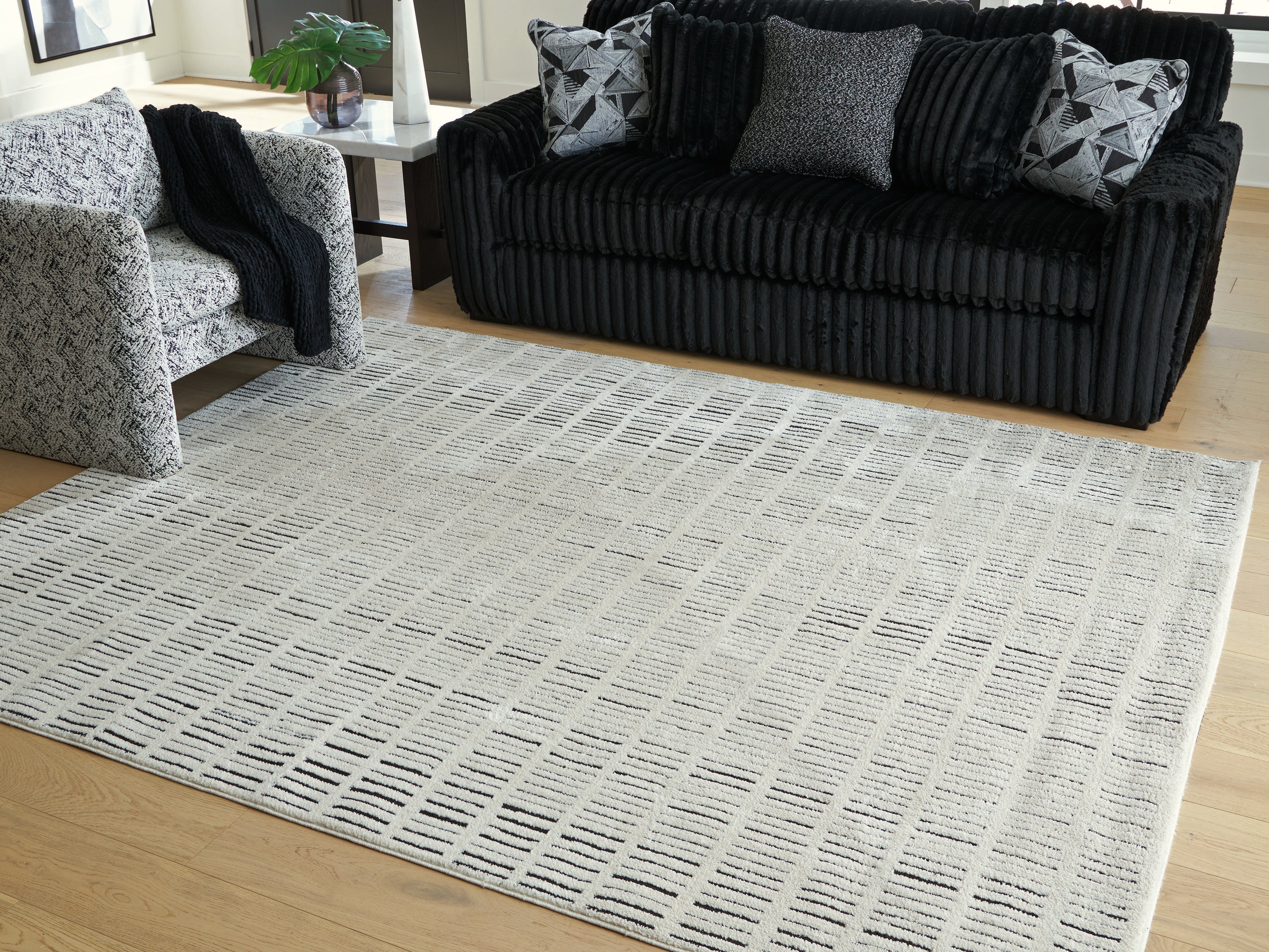 Best Furniture Outlet - Ashley Furniture - Turinwith Rug - 7'10" x 9'10" Area Rug / Ivory/Black - R407551