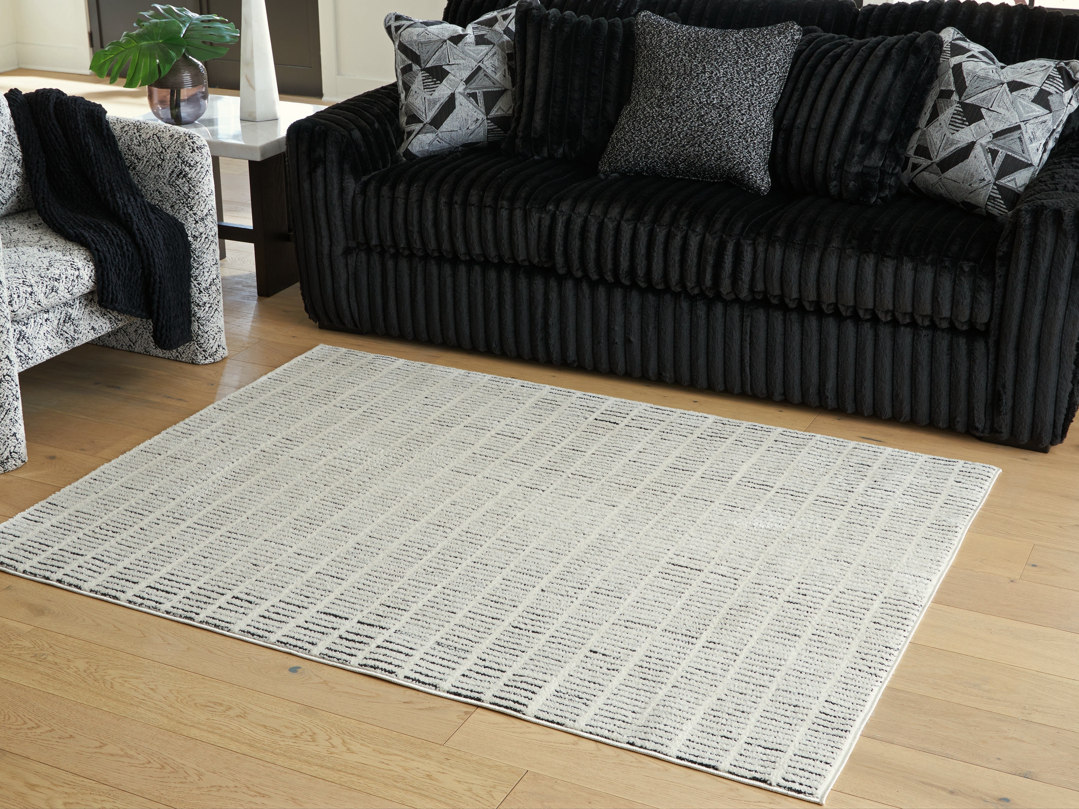Best Furniture Outlet - Ashley Furniture - Turinwith Rug - 7'10" x 9'10" Area Rug / Ivory/Black - R407551