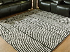 Best Furniture Outlet - Ashley Furniture - Kurtmen Rug - 5' x 7' Area Rug / Black/Ivory - R407592