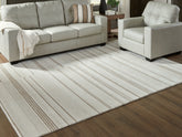 Best Furniture Outlet - Ashley Furniture - Gadence Rug - 7'8" x 10' Area Rug / Ivory/Tan - R407641