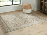 Best Furniture Outlet - Ashley Furniture - Bachby Rug - 5'3" x 7' Area Rug / Multi - R407682