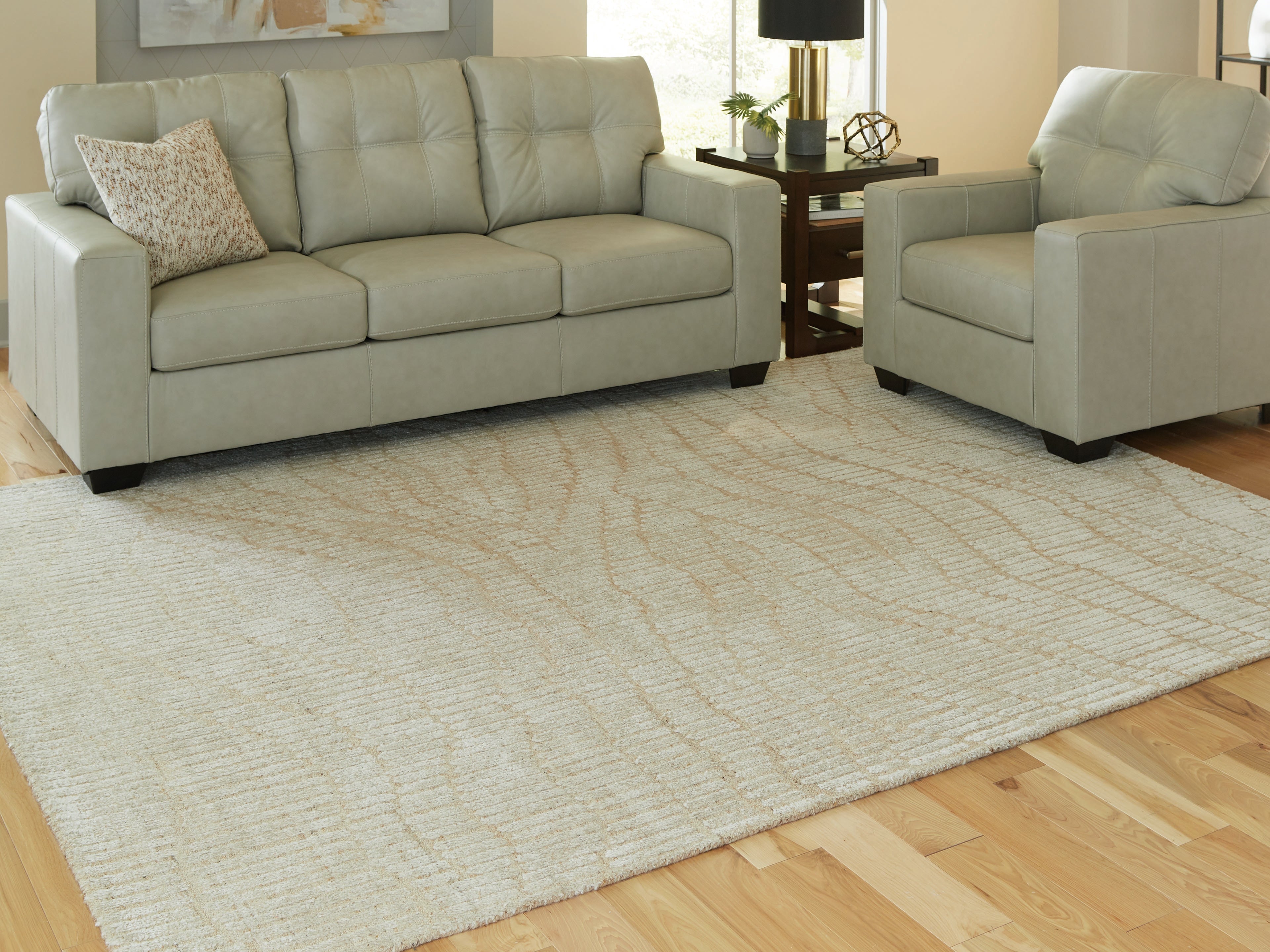Best Furniture Outlet - Ashley Furniture - Jaseena Rug - 7'8" x 10' Area Rug / Beige/Tan - R407721