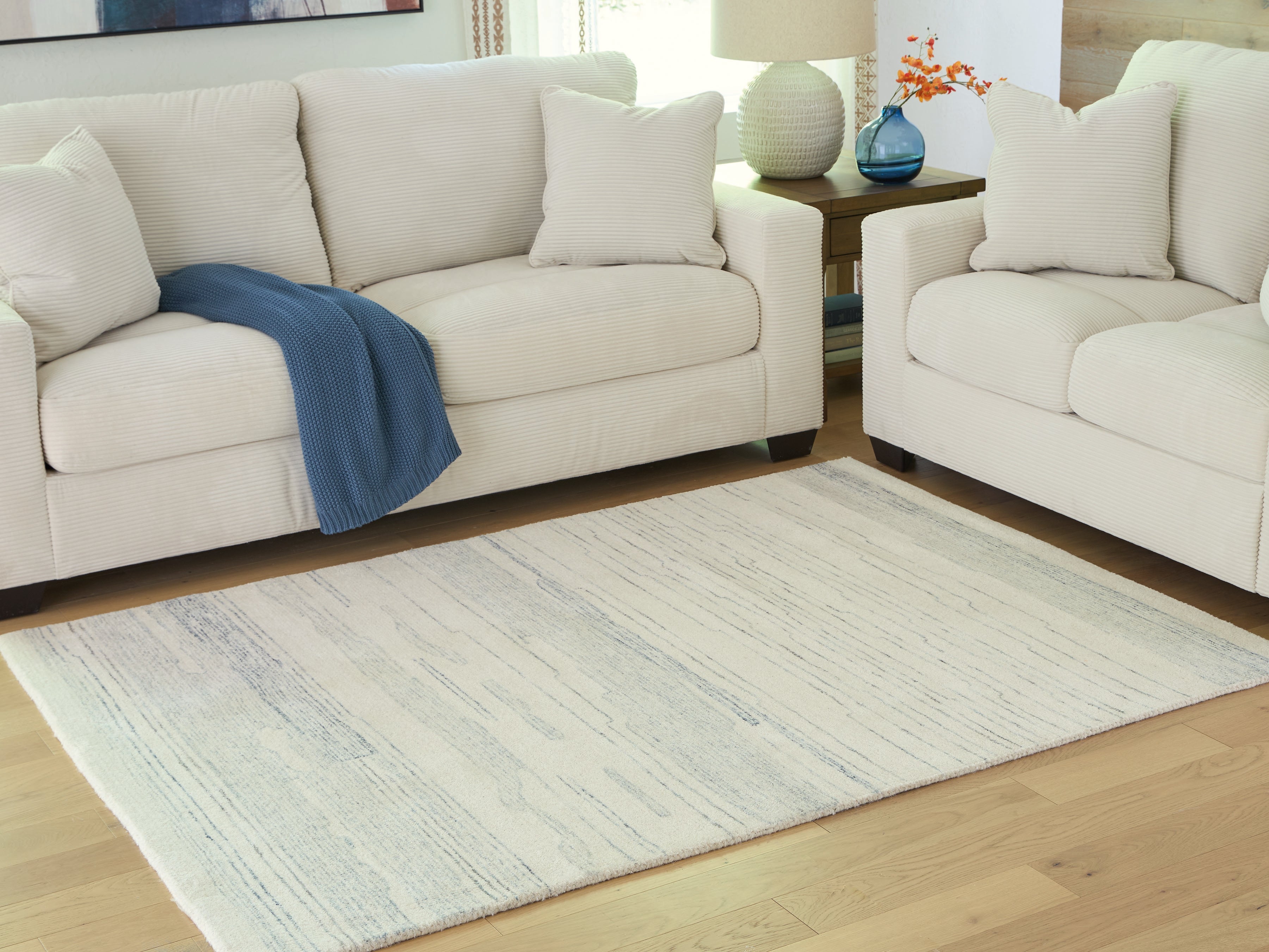 Best Furniture Outlet - Ashley Furniture - Genemost Rug - 5' x 7' Area Rug / Ivory/Blue - R407842