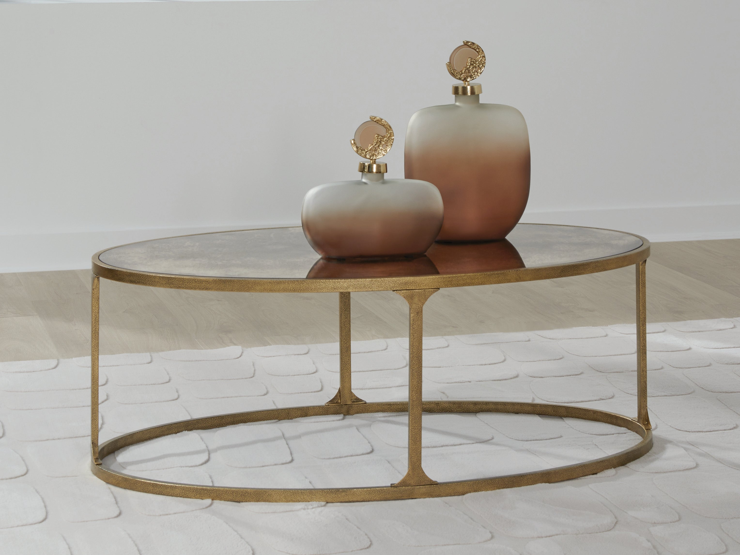 Best Furniture Outlet - Ashley Furniture - Korajane Coffee Table - Oval Cocktail Table / Antique Gold - T399-0