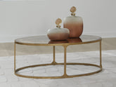 Best Furniture Outlet - Ashley Furniture - Korajane Coffee Table - Oval Cocktail Table / Antique Gold - T399-0