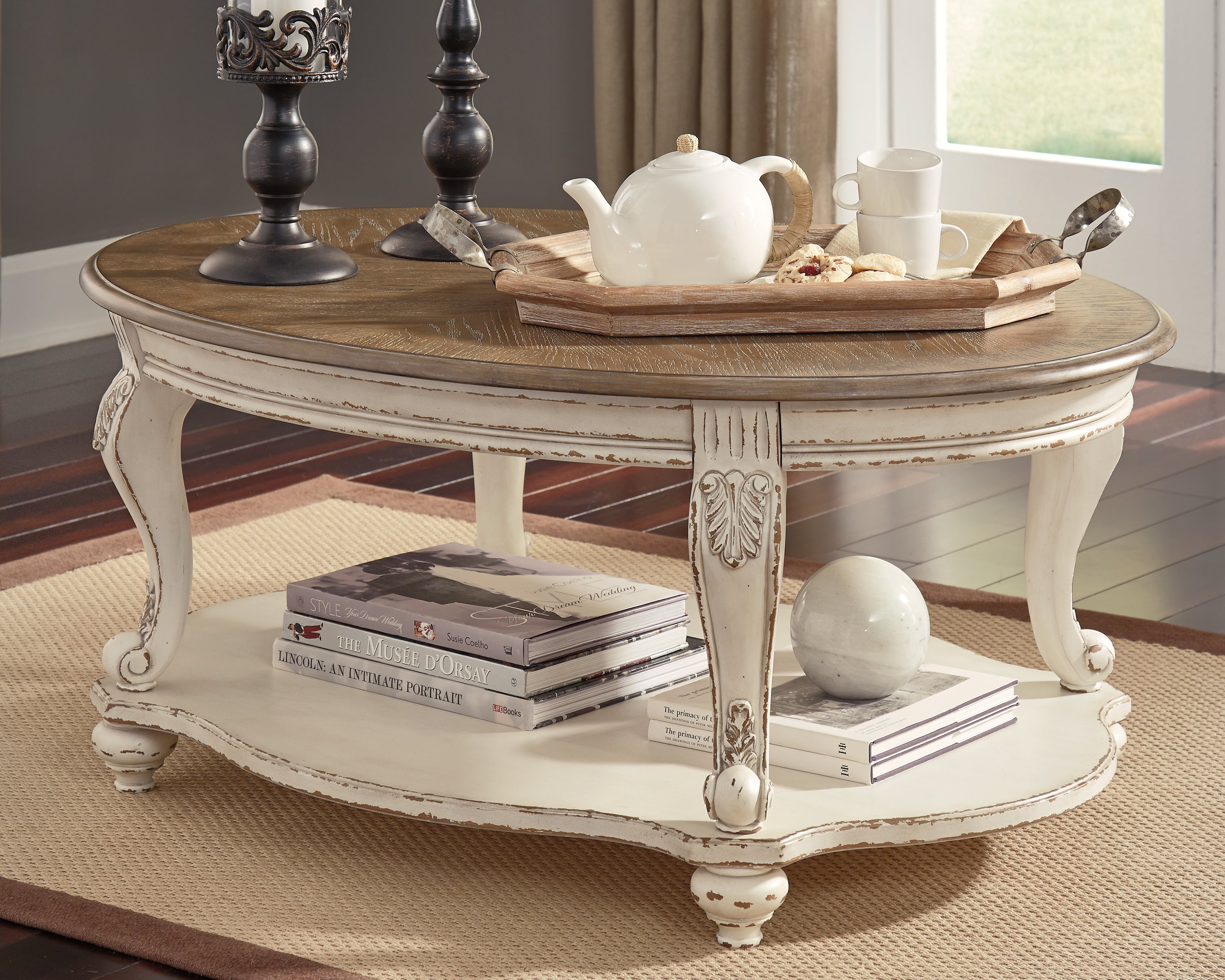 Best Furniture Outlet - Ashley Furniture - Realyn Coffee Table - Oval Cocktail Table / White/Brown - T743-0