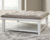 Best Furniture Outlet - Ashley Furniture - Kanwyn Upholstered Ottoman Coffee Table - UPH Ottoman Cocktail Table / Whitewash - T937-21