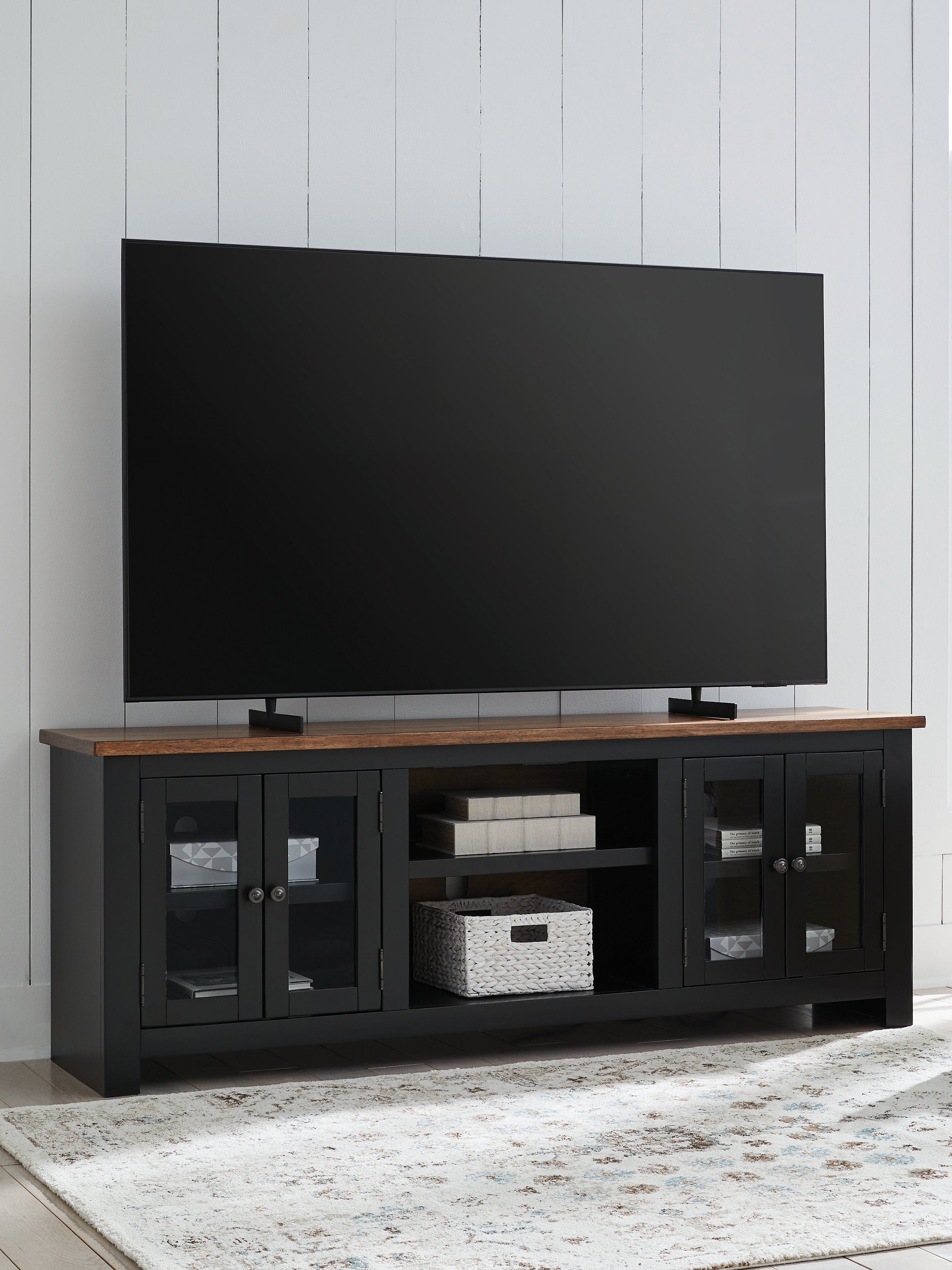 Best Furniture Outlet - Ashley Furniture - Wildenauer 76" TV Stand - 76" / Brown/Black - W664-68