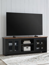 Best Furniture Outlet - Ashley Furniture - Wildenauer 76" TV Stand - 76" / Brown/Black - W664-68