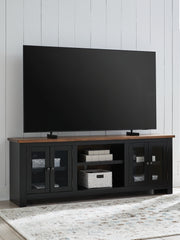 Best Furniture Outlet - Ashley Furniture - Wildenauer 76" TV Stand - 76" / Brown/Black - W664-68