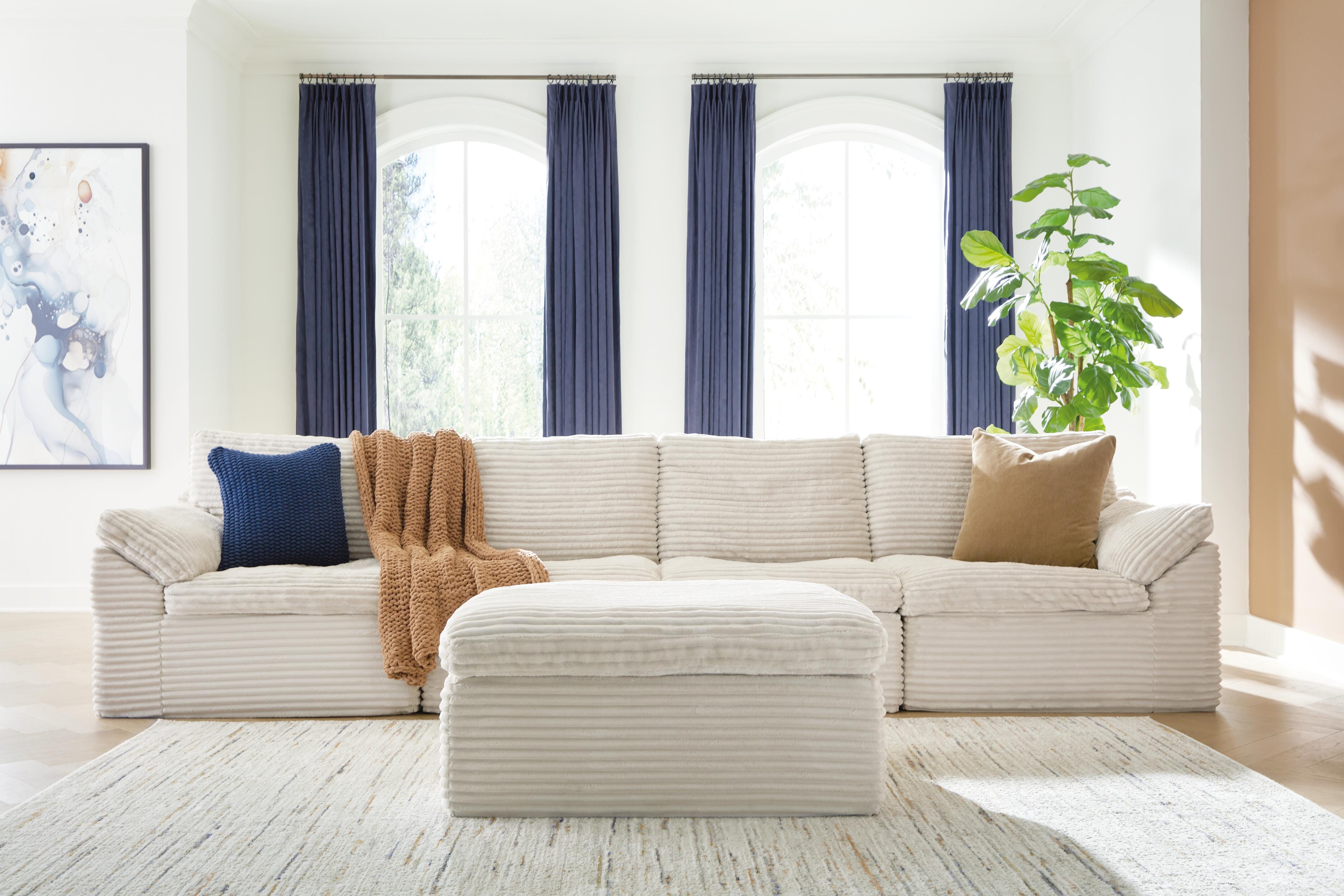 Best Furniture Outlet - Ashley Furniture - Fannin Sectional - RAF 4-Piece Sectional with Ottoman / Ivory - PC84304S1