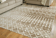Best Furniture Outlet - Ashley Furniture - Bunchly Rug - 7'10" x 10'3" Washable Rug / Tan/Brown/Cream - R406221