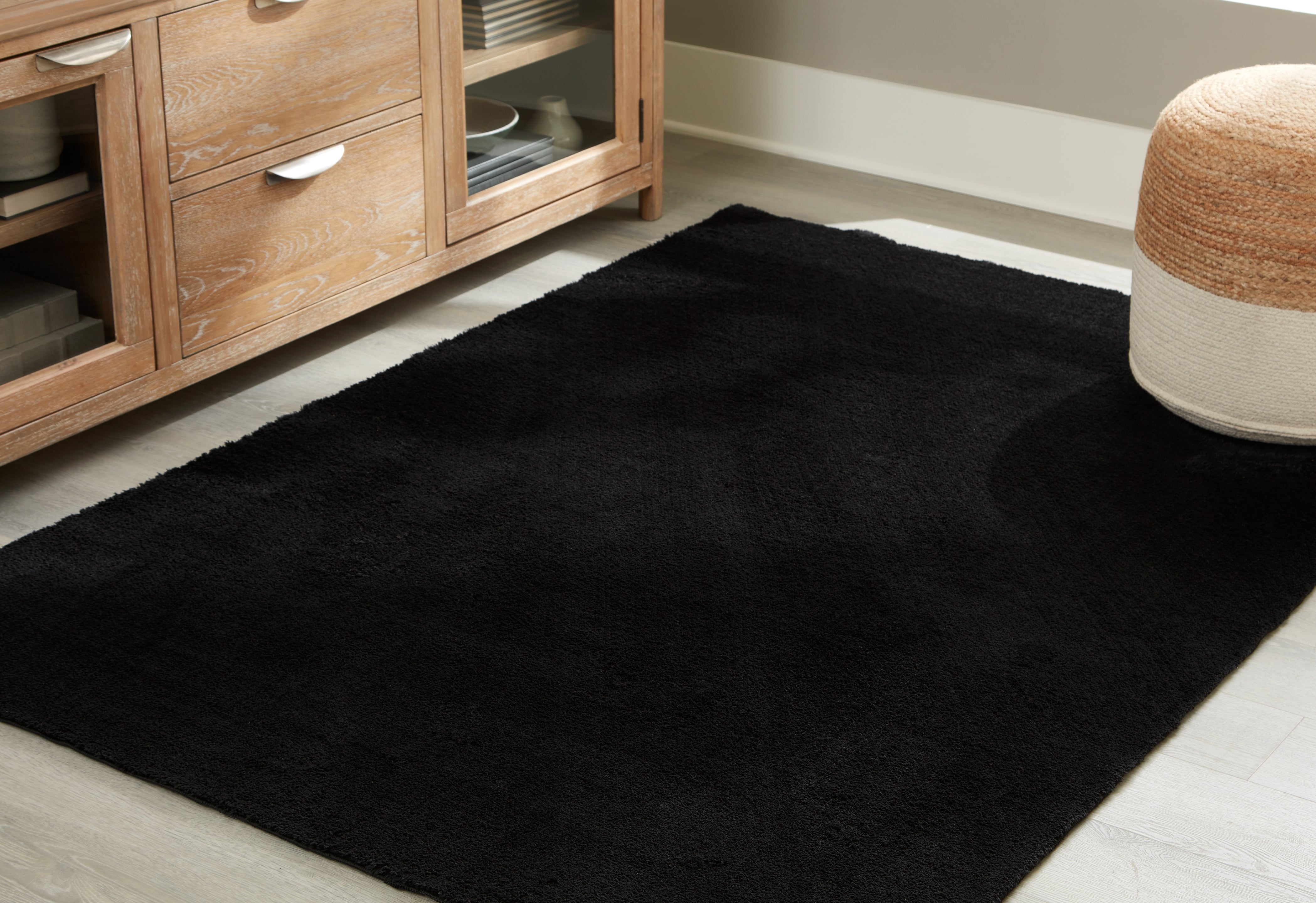 Best Furniture Outlet - Ashley Furniture - Anaben Rug - 5' x 7' Washable Rug / Black - R406312
