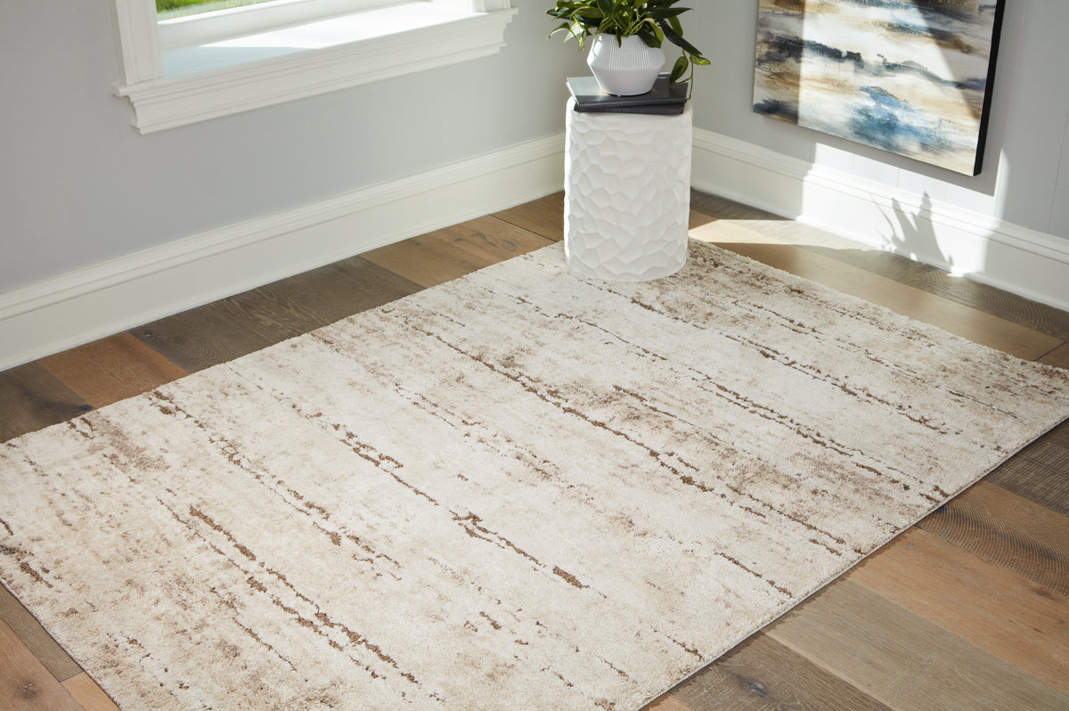 Best Furniture Outlet - Ashley Furniture - Kasney Rug - 8' x 10' Rug / Cream/Brown - R406851