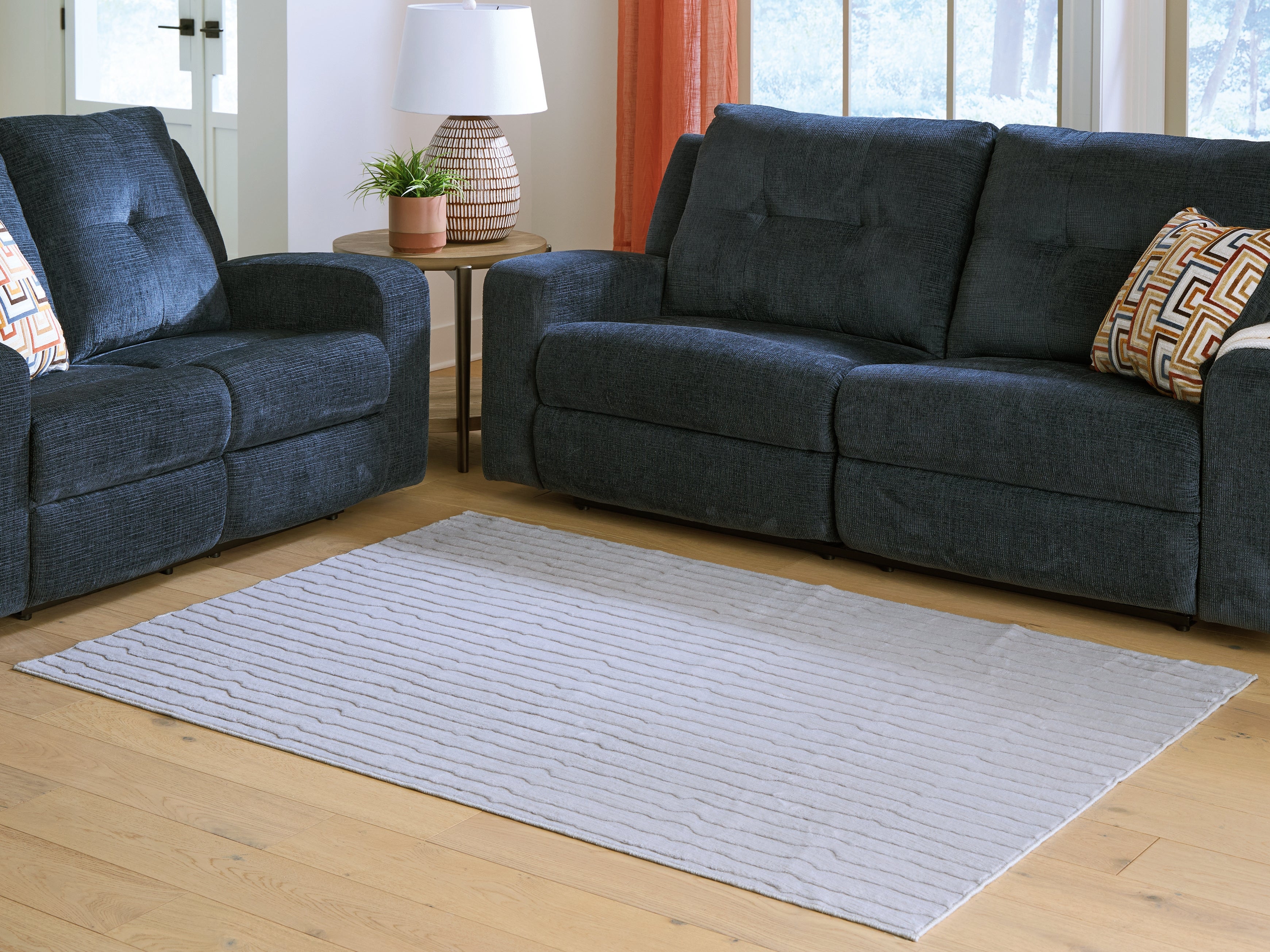 Best Furniture Outlet - Ashley Furniture - Worthley Rug - Washable 5' x 7' Area Rug / Gray - R407452